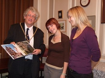 The Mayor of Lichfield, Councillor Mark Warfield, learns about Limburg from Lisa and Jana